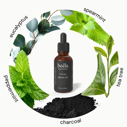 Beela Charcoal Detox Scalp Oil with peppermint, tea tree, eucalyptus, spearmint, and activated charcoal for deep scalp cleanse.