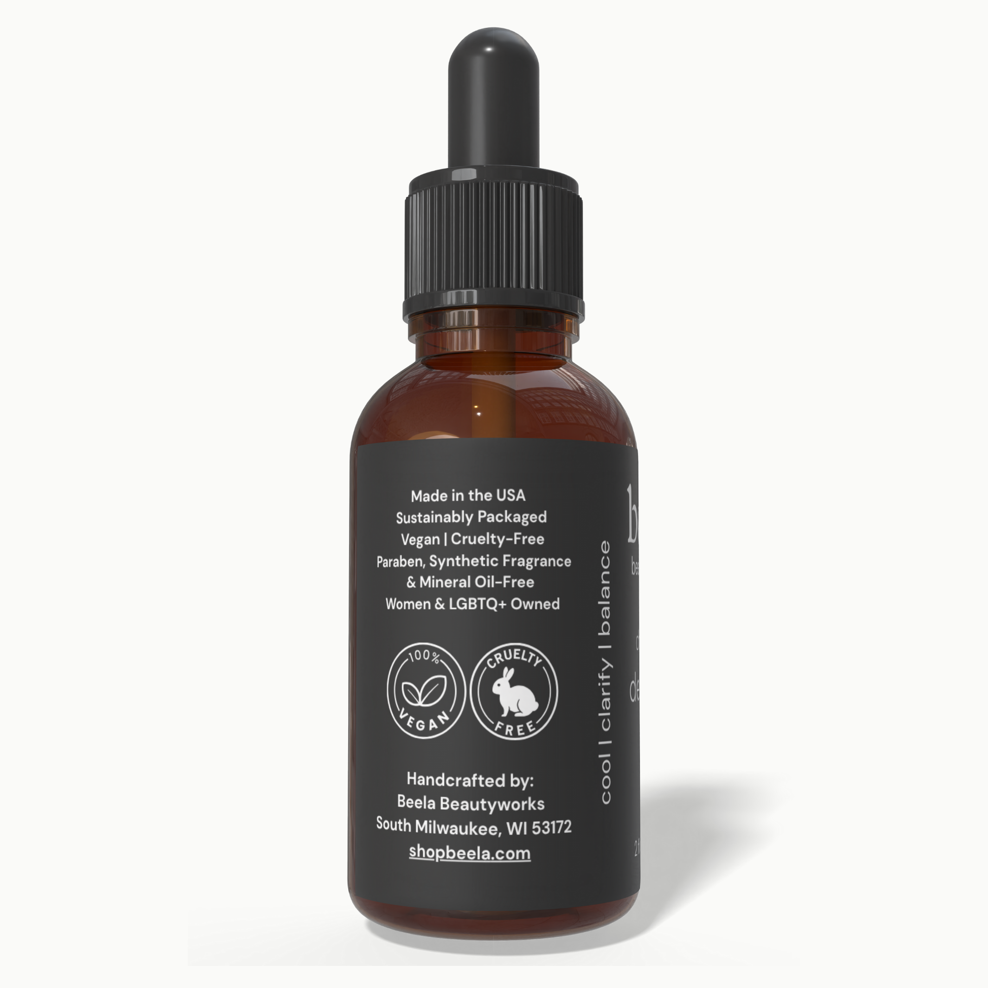 Beela Charcoal Detox Scalp Oil side label showing vegan, cruelty-free, and sustainably packaged product details.