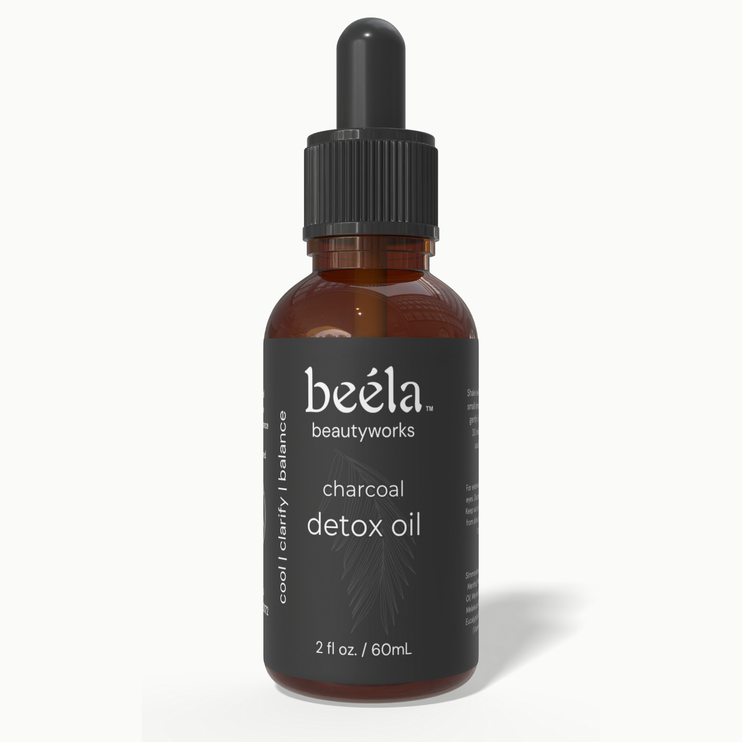 Beela Charcoal Detox Scalp Oil — purifying pre-wash scalp treatment that deeply cleanses and refreshes buildup.