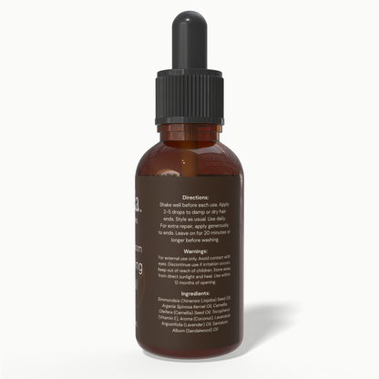 Back label of Beela Coconut Bloom Nourishing End Oil with directions, warnings, and ingredients like coconut, jojoba, argan, and sandalwood.