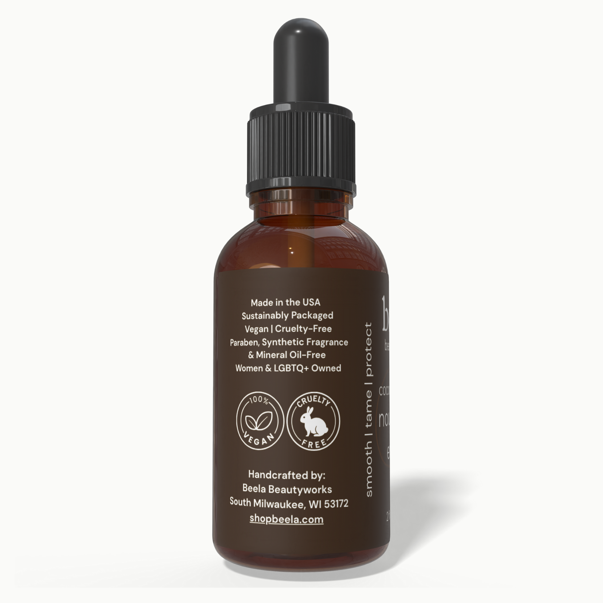 Beela Coconut Bloom Nourishing End Oil side label showing vegan, cruelty-free, and sustainably packaged product details.