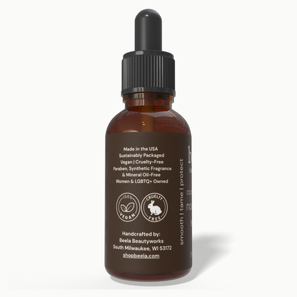 Beela Coconut Bloom Nourishing End Oil side label showing vegan, cruelty-free, and sustainably packaged product details.