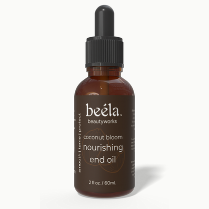 Beela Coconut Bloom End Oil — nourishing leave-in oil that softens and protects dry hair ends.