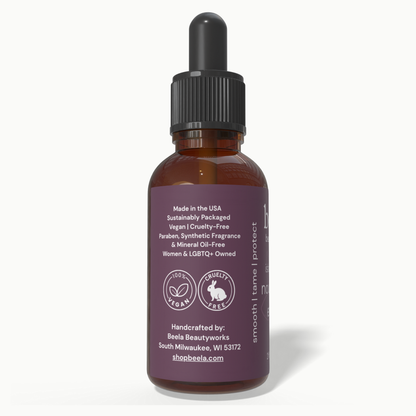 Beela Island Shine Nourishing End Oil side label showing vegan, cruelty-free, and sustainably packaged product details.