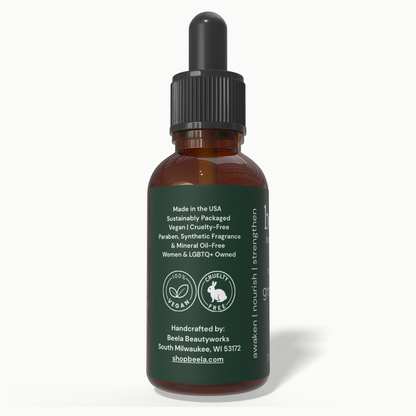 Beela Rosemary Growth Scalp Oil side label showing vegan, cruelty-free, and sustainably packaged product details.