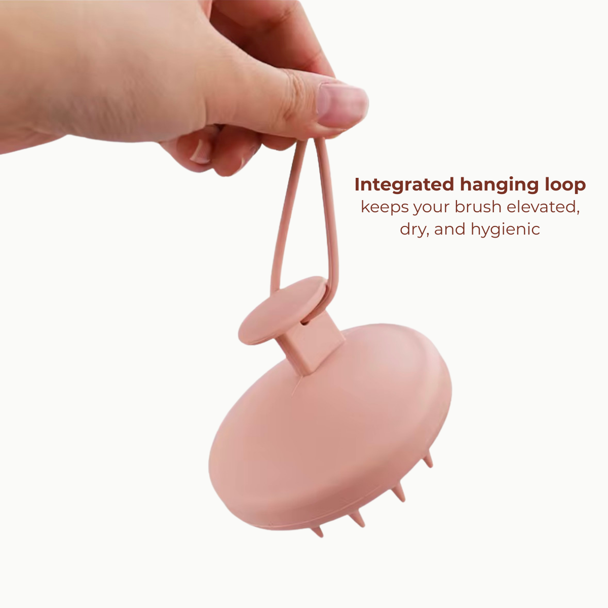 Silicone scalp scrubber with hanging loop for hygienic storage, easy drying, and healthy scalp care