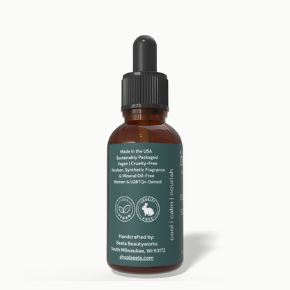 Beela Soothing Scalp Oil side label showing vegan, cruelty-free, and sustainably packaged product details.